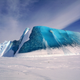 A partly capsized iceberg including deep-blue marine ice and white glacial ice.